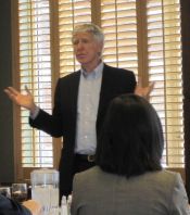 Lester speaking to students and faculty